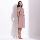 Right View of a Model wearing Cotton Corduroy Mauve Coat Dress