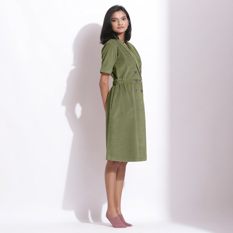Right View of a Model wearing Cotton Corduroy Sage Green Coat Dress