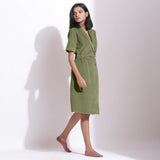 Right View of a Model wearing Cotton Corduroy Sage Green Coat Dress