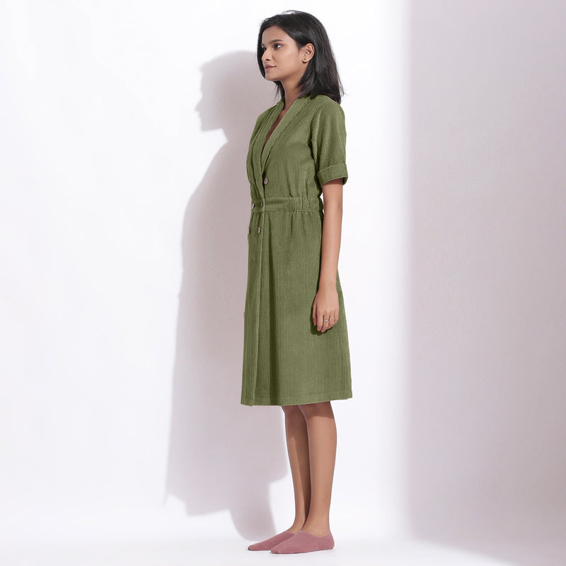 Left View of a Model wearing Cotton Corduroy Sage Green Coat Dress