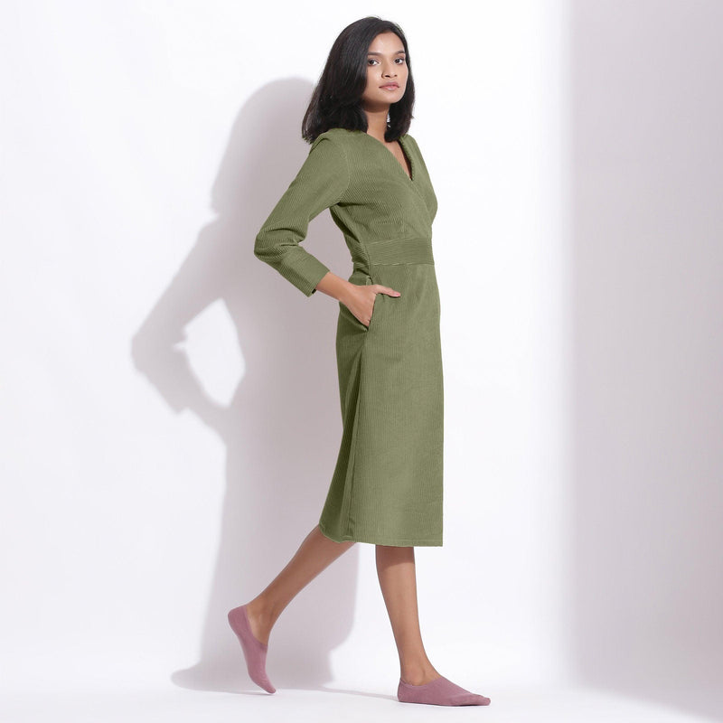 Right View of a Model wearing Cotton Corduroy Sage Green Surplice Dress