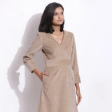 Front Detail of a Model wearing Taupe Beige Warm Cotton Corduroy Knee Length Dress