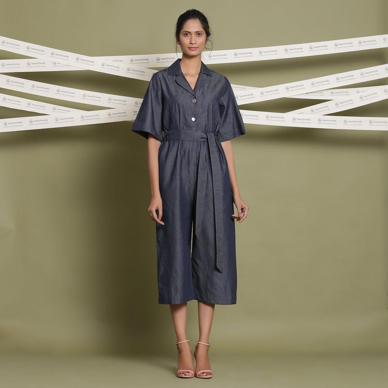 Front View of a Model wearing Cotton Denim Loose Fit Flared Jumpsuit
