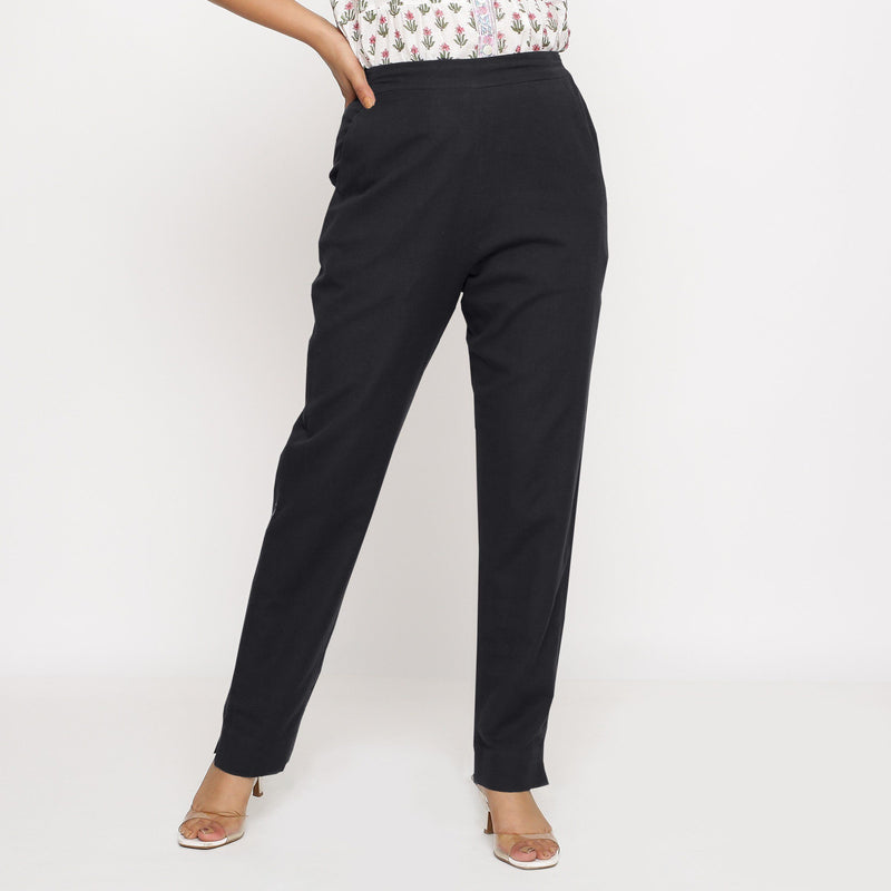 Front View of a Model wearing Cotton Flax Mid-Rise Black Tapered Pant