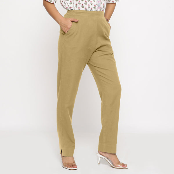 Right View of a Model wearing Cotton Flax Mid-Rise Light Khaki Tapered Pant
