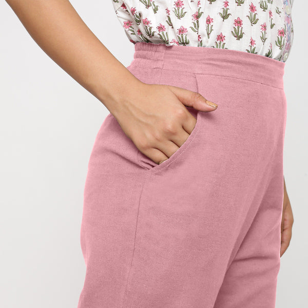 Right Detail of a Model wearing Cotton Flax Mid-Rise Pink Tapered Pant