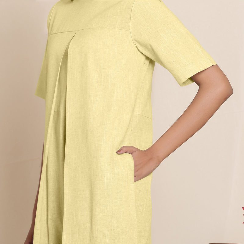 Front Detail of a Model wearing Cotton Lemon Yellow Box Pleated Jumpsuit