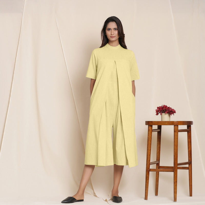 Front View of a Model wearing Cotton Lemon Yellow Box Pleated Jumpsuit