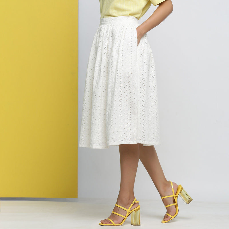 Left View of a Model wearing Off-White Cotton Schiffli Gathered Skirt