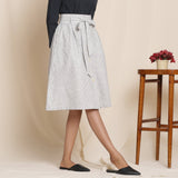 Right View of a Model wearing Grey 100% Cotton Striped High-Rise Paperbag Skirt