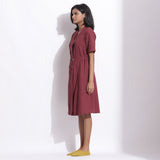 Left View of a Model wearing Barn Red Warm Cotton Waffle Knee Length Coat Dress