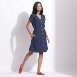 Right View of a Model wearing Cotton Waffle Navy Blue Button-Down Dress