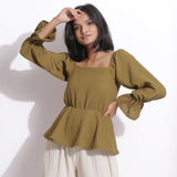 Front View of a Model wearing Cotton Waffle Olive Green Peplum Top