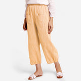 Left View of a Model wearing Yellow Yarn Dyed Cotton Harem Pant