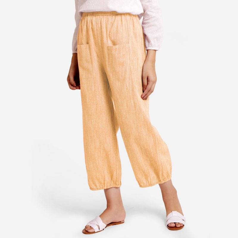 Left View of a Model wearing Yellow Yarn Dyed Cotton Harem Pant
