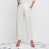 Front View of a Model wearing Off-White Banded Hem Straight Pant