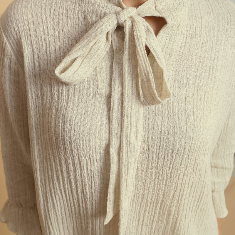 Front Detail of a Model wearing Crinkled Cotton Flax Undyed Straight Top