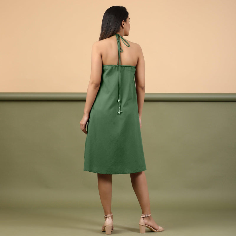 Back View of a Model wearing Dark Green Green Shibori Halter Neck A line Dress