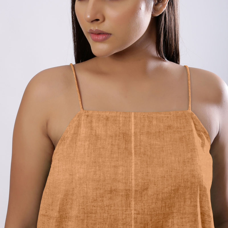 Front Detail of a Model wearing Desert Yellow 100% Linen Flared Camisole Top