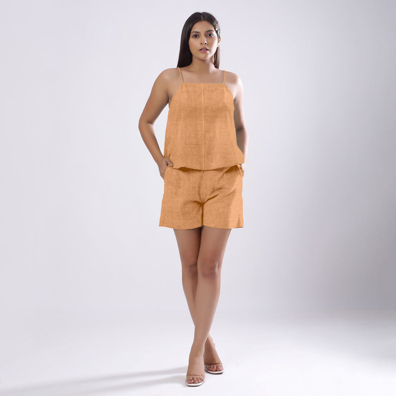 Front View of a Model wearing Desert Yellow 100% Linen Flared Camisole Top
