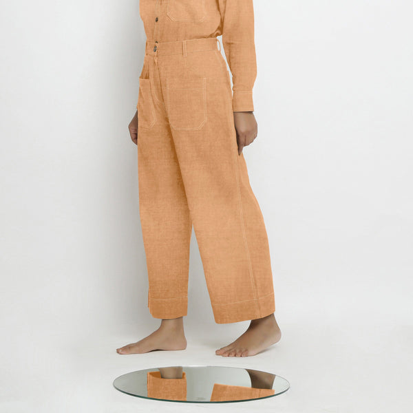 Left View of a Model wearing Desert Yellow Linen Patch Pocket Wide Legged Pant