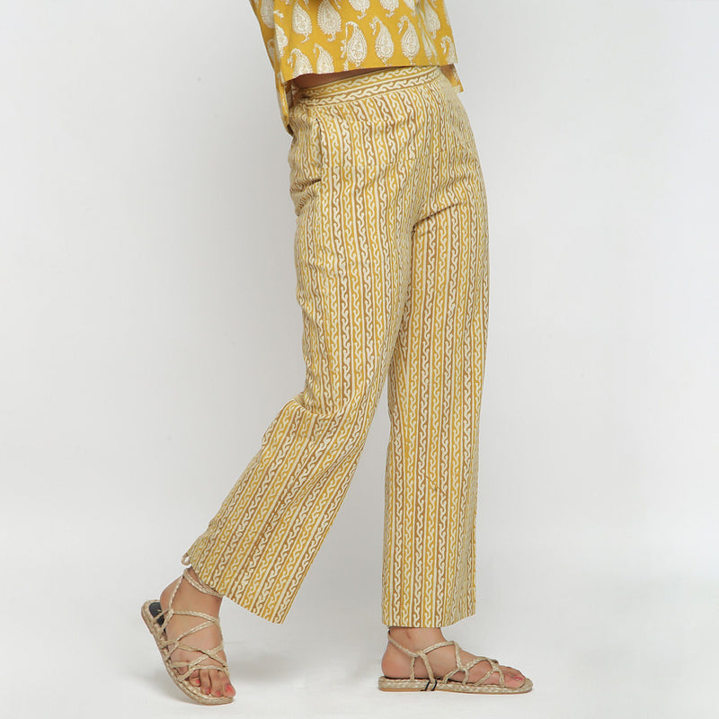 Right View of a Model wearing Hand-Block Printed Mustard Straight Pant