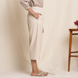 Right View of a Model wearing Dusk Beige Warm Cotton Culottes Striped Pant