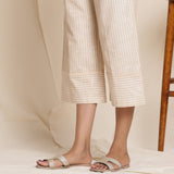 Left Detail of a Model wearing Dusk Beige Warm Cotton Culottes Striped Pant