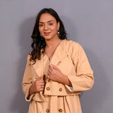 Front Detail of a Model wearing Dusk Beige Warm Cotton Flannel Double-Breasted Button-Down Shacket