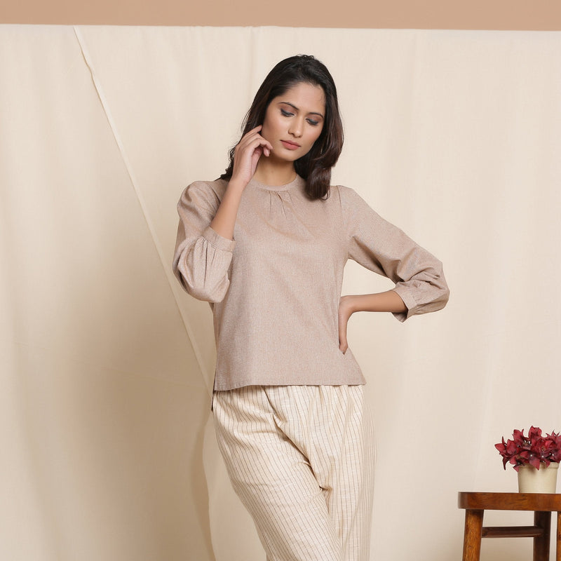 Front View of a Model wearing Dusk Brown Straight Gathered Top