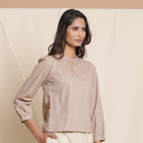 Right View of a Model wearing Dusk Brown Straight Gathered Top