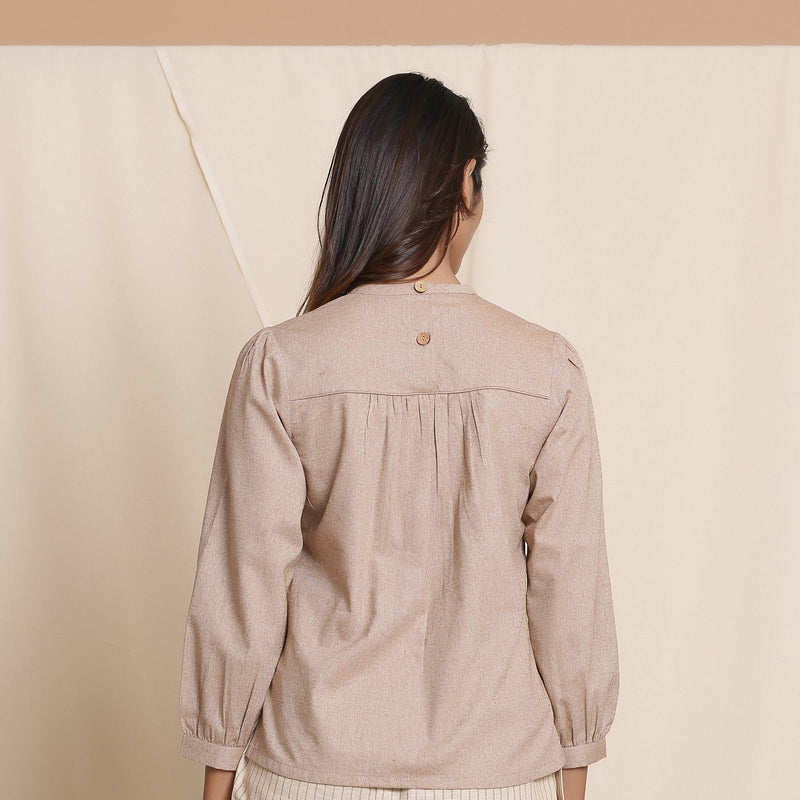 Back View of a Model wearing Dusk Brown Straight Gathered Top