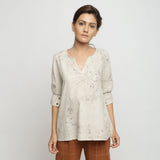Front View of a Model wearing Beige Dabu Printed Deep Neck A-Line Top