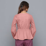 Back View of a Model wearing English Rose V-Neck Flannel Peplum Top