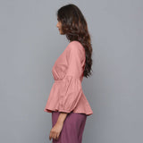 Left View of a Model wearing English Rose V-Neck Flannel Peplum Top