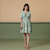 Front View of a Model wearing Forest Green Shibori Tie-Dye Cotton Knee Length Dress