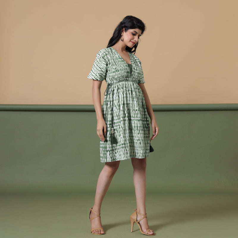 Right View of a Model wearing Forest Green Shibori Tie-Dye Cotton Knee Length Dress