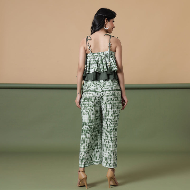 Back View of a Model wearing Forest Green Tie-Dye Ankle Length Cotton Camisole Jumpsuit