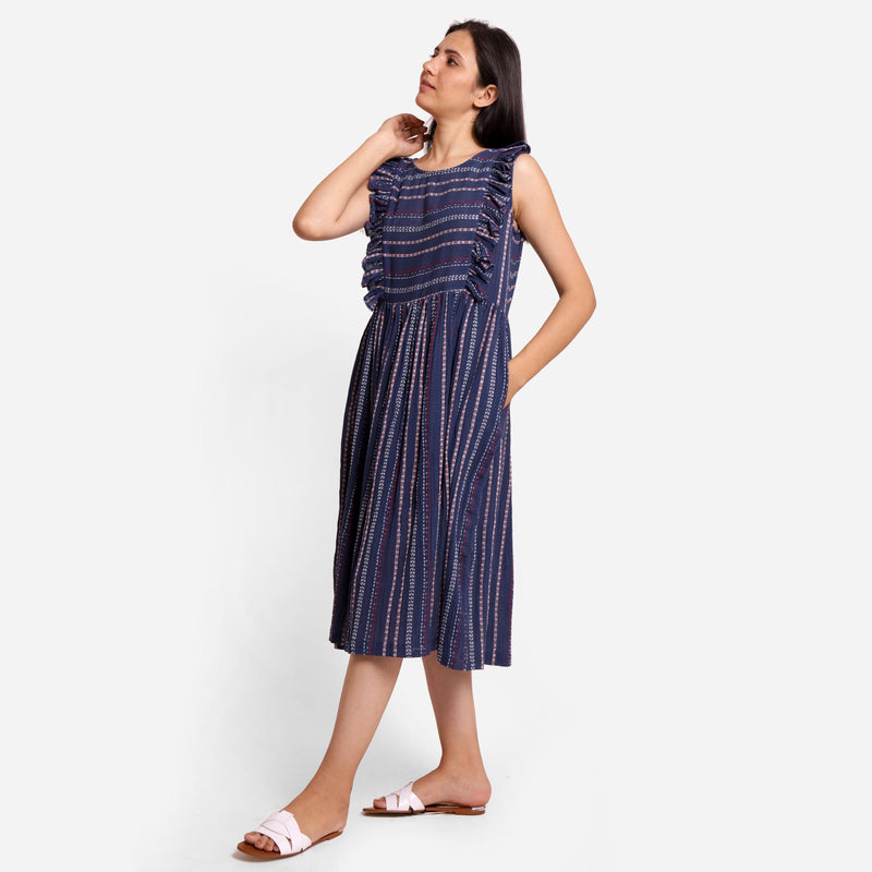 Left View of a Model wearing Navy Blue Crinkled Cotton Midi Dress