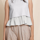 Front Detail of a Model wearing Flannel Cloudy Grey Frilled Short Top