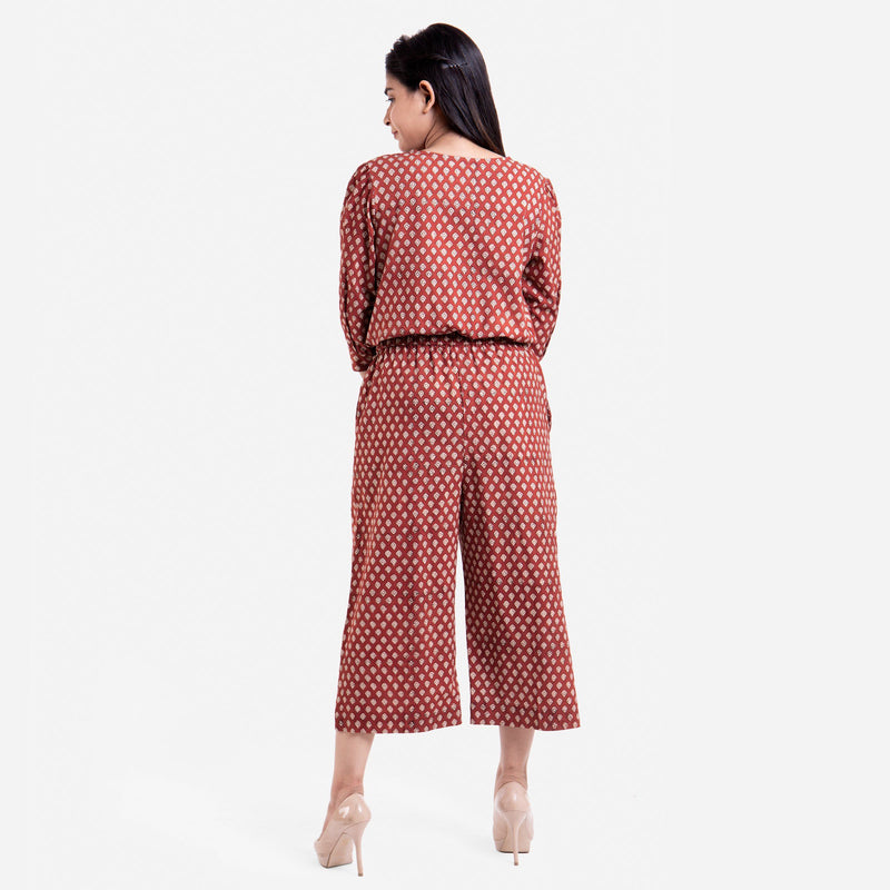 Back View of a Model wearing Hand Block Printed Button-Down Jumpsuit