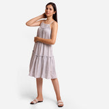 Left View of a Model wearing White Yarn Dyed Cotton Camisole Dress
