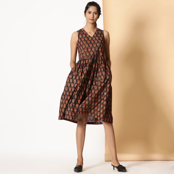 Front View of a Model wearing Floral Block Printed Gathered Knee Length Cotton Dress