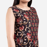 Front Detail of a Model wearing Black Floral Block Print Cotton Yoke Maxi Dress