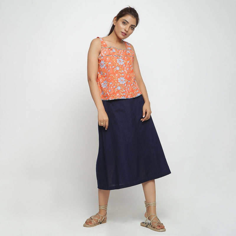 Right View of a Model wearing Orange Floral Block Printed Square Neck Cotton Top