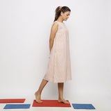 Right View of a Model wearing Vegetable Dyed Pink Paneled Dress