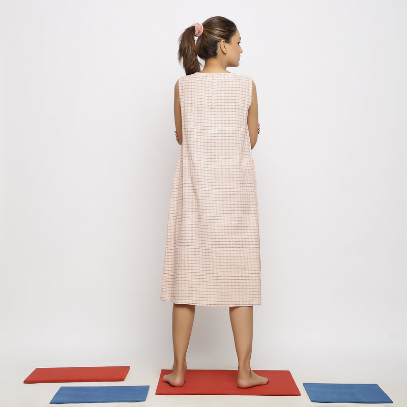Back View of a Model wearing Vegetable Dyed Pink Paneled Dress
