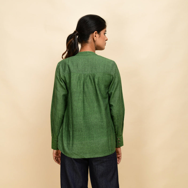 Back View of a Model wearing Forest Green Handspun 100% Cotton Yoked Top