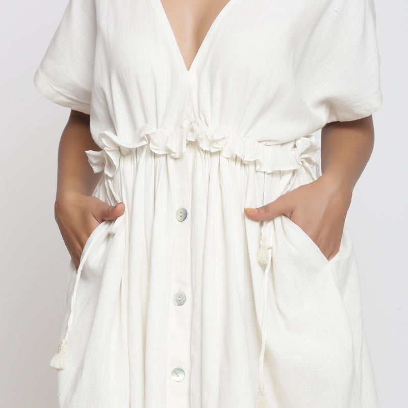 Front Detail of a Model wearing Frilled White Deep Neck Bohemian Dress