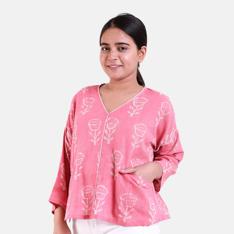 Front View of a Model wearing Fuchsia Dabu Printed V-Neck Floral Top